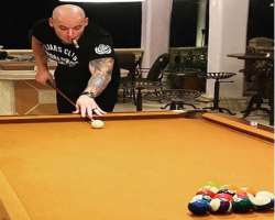 He loves to play pool in his free time.